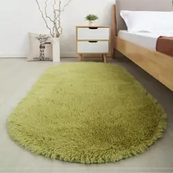 Yataq otağı fotoşəkilində oval kilimlər