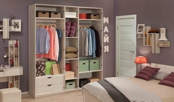 Linen closet with shelves in the bedroom photo