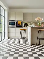 White linoleum in the interior of the kitchen