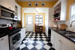 White linoleum in the interior of the kitchen