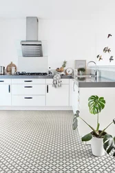 White linoleum in the interior of the kitchen