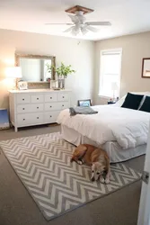 Carpet In The Bedroom Under The Bed In The Interior
