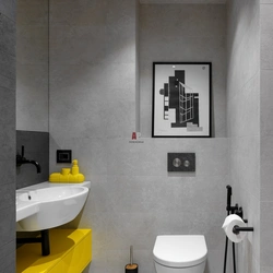 Gray toilet in the bathroom interior