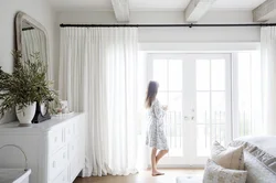 White tulle in the bedroom interior