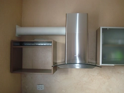 Kitchen hood with wall outlet photo