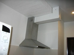 Kitchen hood with wall outlet photo