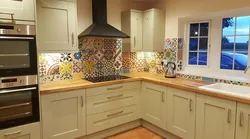 Kitchen interior with colored aprons