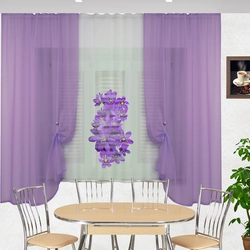 Lilac curtains in the kitchen interior