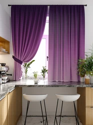 Purple curtains in the kitchen interior