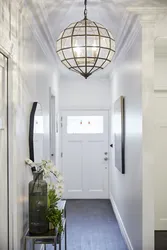 Chandelier in a small hallway photo in the interior