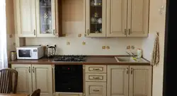 Пліта карычневая ў інтэр'еры кухні