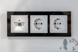 Black sockets in the kitchen interior