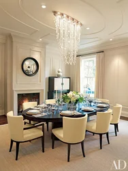 Chandelier in the living room above the table in the interior