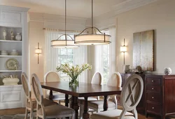 Chandelier in the living room above the table in the interior