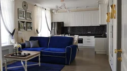 Blue sofa in the interior of the kitchen living room photo