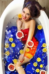 Photo in a milk bath with flowers