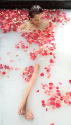Photo In A Milk Bath With Flowers