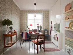 Checkered wallpaper in the kitchen interior