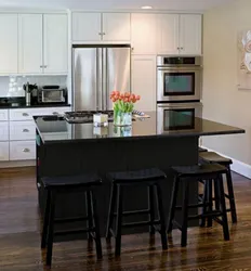 White kitchen with black table photo