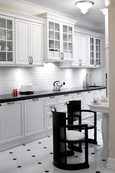 White Kitchen With Black Table Photo