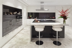 White kitchen with black table photo