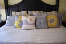 Photo of pillows in the bedroom interior photo
