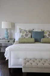 Photo of pillows in the bedroom interior photo