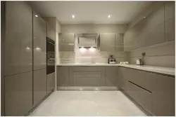 Beige kitchen with gray countertop in the interior