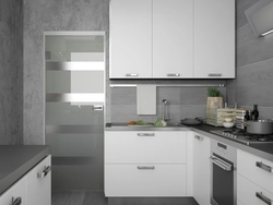 Photo of a kitchen with a white refrigerator