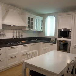 White Kitchen Design With Brown Countertops
