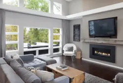 Gray fireplace in the living room interior