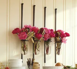 Artificial flowers in the kitchen interior