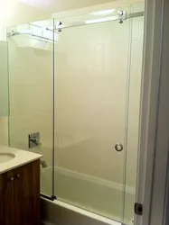 Glass doors for bathtub photo