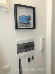 Hide the router in the hallway like on the wall photo