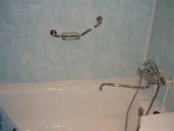 Faucet In The Wall In The Bathroom Photo