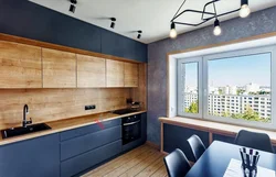 Dark kitchen with wooden countertop in the interior