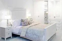 Accents in a white bedroom photo