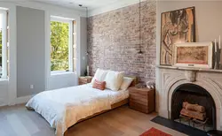 Brick wallpaper in the bedroom interior