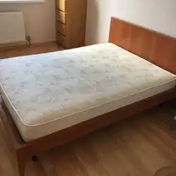 Double bed with mattress photo