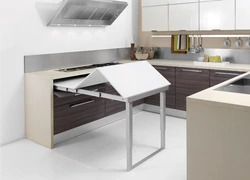 Small Kitchen With Pull-Out Table Photo