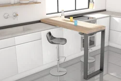 Small kitchen with pull-out table photo
