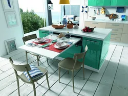Small kitchen with pull-out table photo