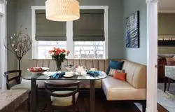 Kitchen design with sofa and table by the window