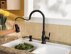 Kitchen faucet stone photo
