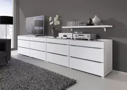 White long chest of drawers in the living room photo