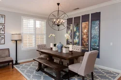 Table against the wall in the living room interior