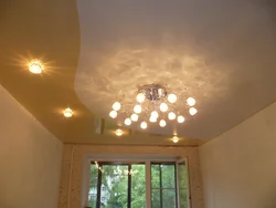 Combined suspended ceilings in the living room photo