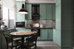 Gray-green wallpaper in the kitchen interior