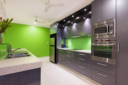 Gray-green wallpaper in the kitchen interior