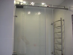 Sliding partitions for bathtub photo